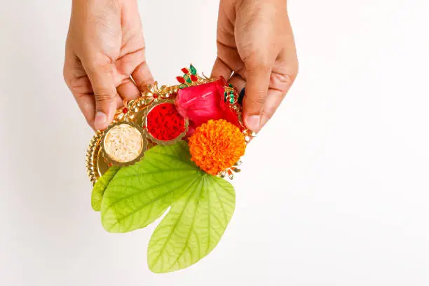 Photo of Happy Dussehra greeting card , green leaf and rice