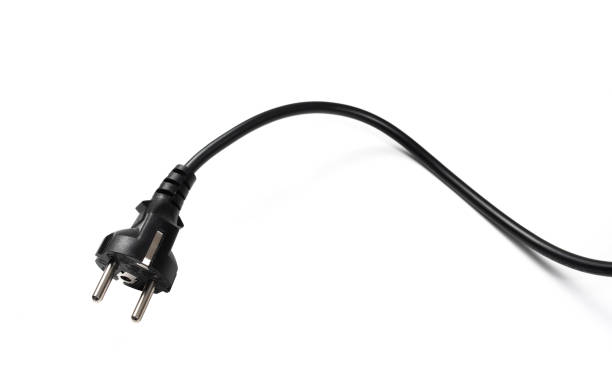 istock black long power cable isolated on white background. 1171873724