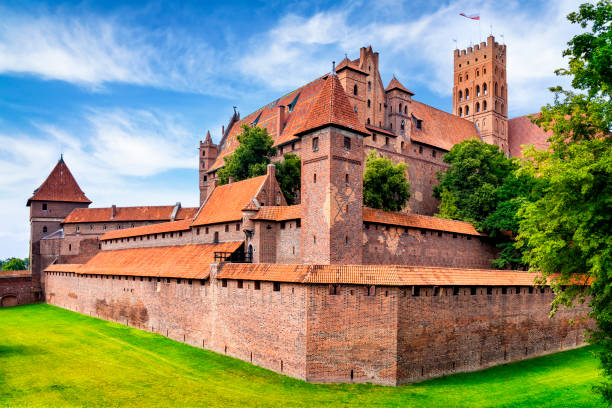 Medieval Malbork Castle, Poland Malbork, Poland - July 27, 2019:Medieval Malbork Castle, Poland. The largest castle in the world by surface area, and the largest brick building in Europe. Historical capitol of the Teutonic Order - Crusaders malbork photos stock pictures, royalty-free photos & images