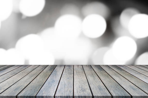 istock Perspective empty wooden table on top over blur background, can be used mock up for montage products display or design layout. 1171878273