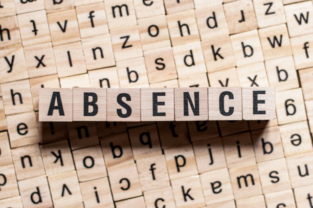 istock the word of ABSENCE on building blocks concept 1171878713