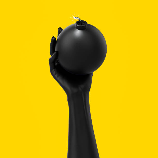istock Black hand sculpture holding a bomb, abstract threat and danger concept 1171879784