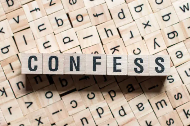 Photo of the word of CONFESS on building blocks concept