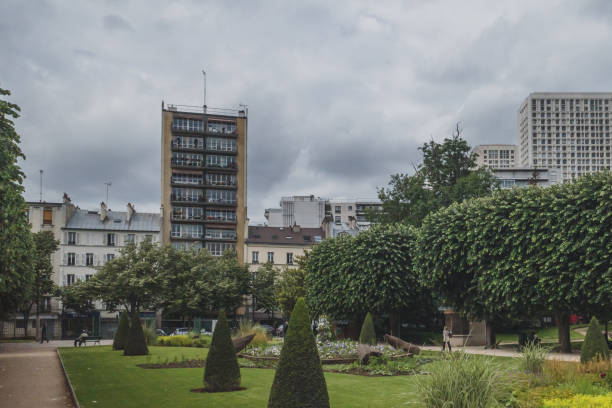 June 14, 2019 - Paris, France: Locals enjoying afternoon at Choisy park in 13th arrondissement