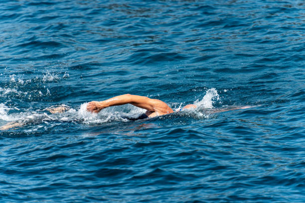 istock Freestyle swimmer in the sea - Front crawl 1171881844