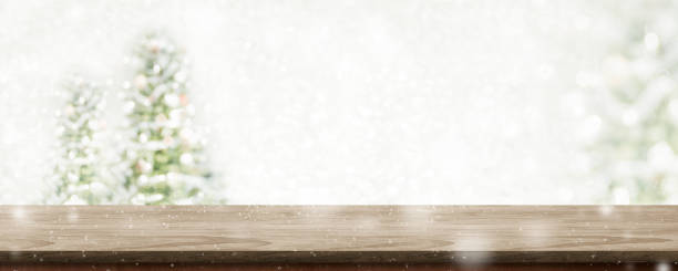istock Christmas wood table top at blur bokeh christmas tree decor with string light background,Winter holiday greeting card 1171884410