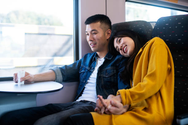 istock Couple traveling together by train 1171885842