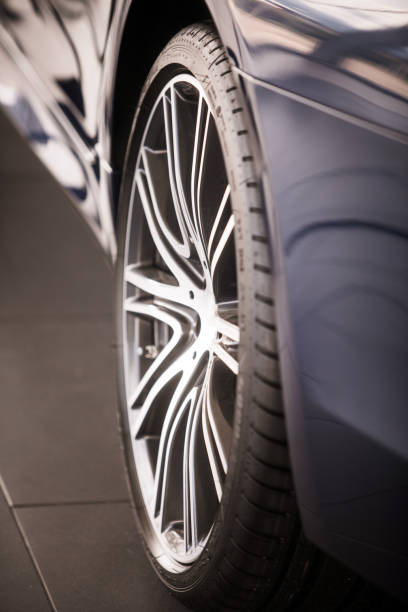 istock Car wheel with shiny rim 1171886476