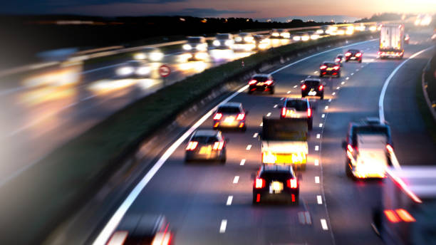Traffic on the germany freeway a1 at night Traffic on the germany freeway a1 at night autobahn stock pictures, royalty-free photos & images