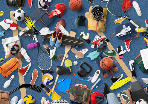 Sports equipment and clothing are scattered in the gym