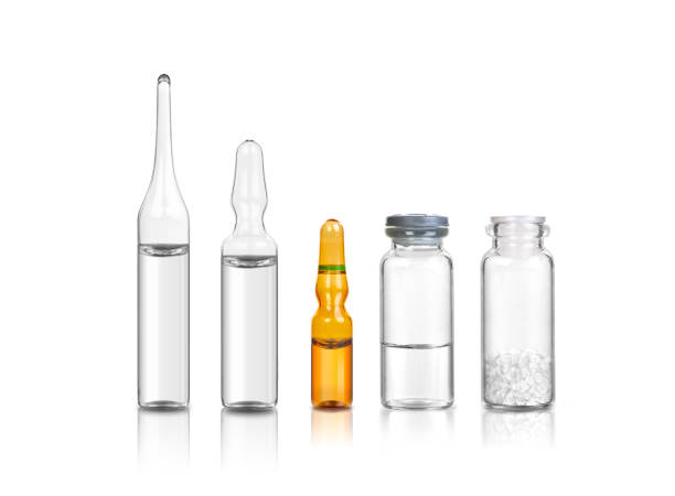 ampoules and medical bottles  isolated on a white background ampoules and medical bottles  isolated on a white background ampoule photos stock pictures, royalty-free photos & images