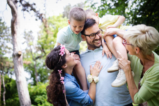 istock Multi generation family enjoying picnic in a park 1171889525