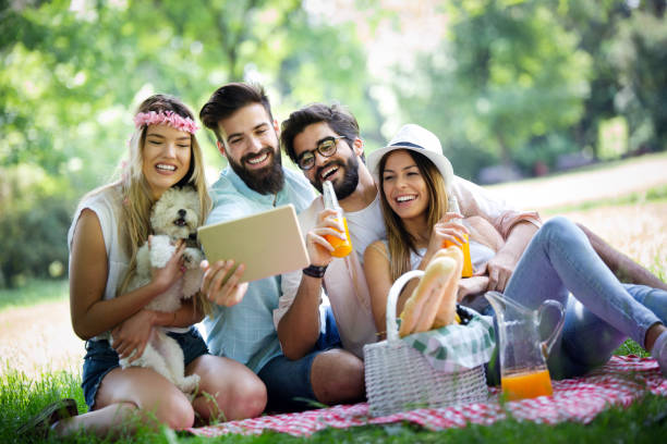 istock Group of young people taking a selfie outdoors, having fun 1171890691