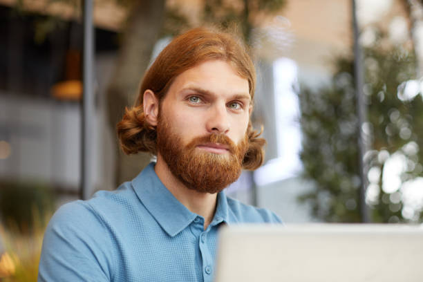 istock Young businessman with laptop 1171895660