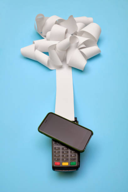 istock Payment terminall with nfc  and a smartphone and a receipt 1171895788