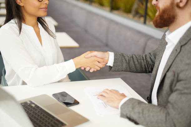 istock Business handshake during meeting 1171896499