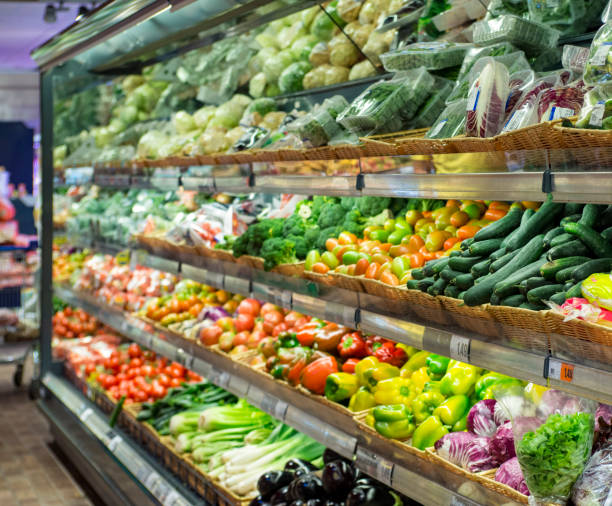 istock vegetable department in a supermarket 1171901717