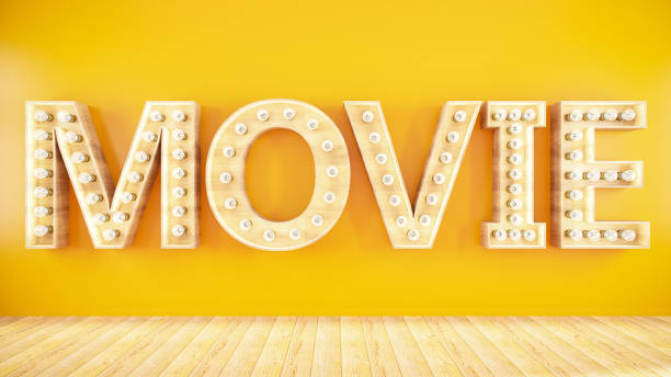 istock Movie Light Bulb Sign on Yellow Wall 1171903584