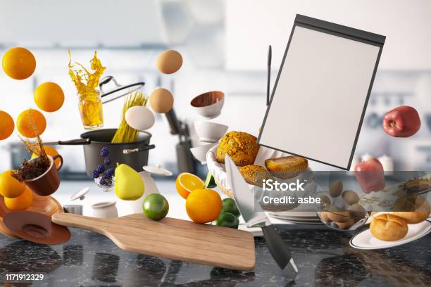 Zero Gravity Levitation In Kitchen With Empty Menu Stock Photo - Download Image Now - Food, Kitchen, Flying