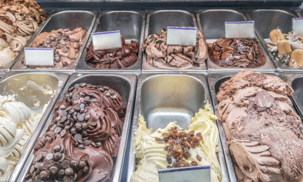 istock Display window for assorted trays of different ice cream flavors 1171913276
