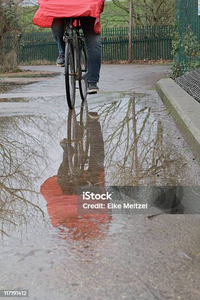 Reflection Of Man Cycling Stock Photo - Download Image Now - 60-64 Years, Active Lifestyle, Active Seniors