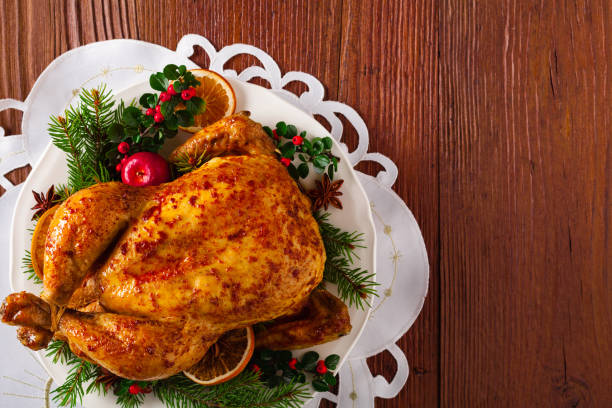 istock Roasted whole chicken with Christmas decoration. 1171917157