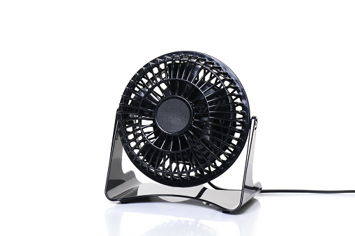 small table fan or ventilator on white background