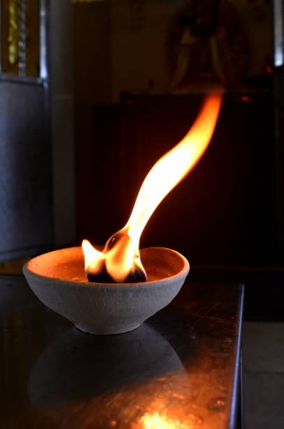 istock Prayer candle burning in a Hindu temple 1171923923