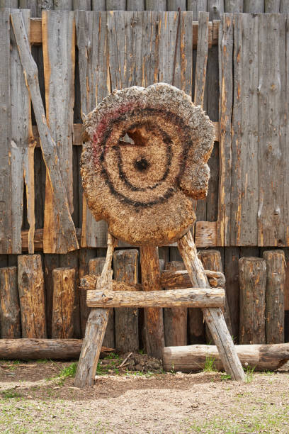 istock Old archery target against a wooden fence 1171925718