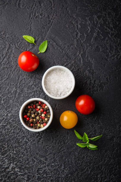 istock Red and yellow fresh tomatos, basil and olive oil 1171925808