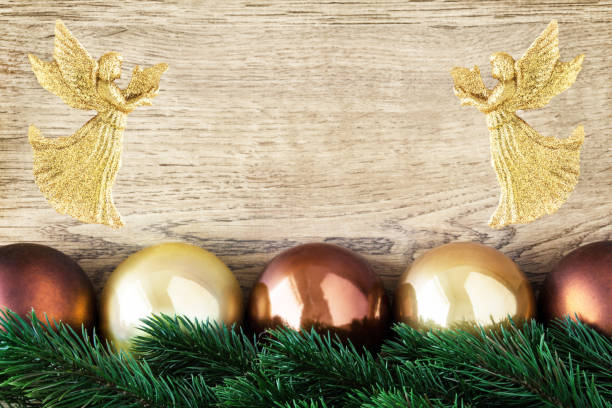 istock Christmas tree balls and angels as background 1171927040