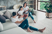 Nice attractive charming friendly adorable cheerful idyllic glad brunette family schoolgirl wearing casual white t-shirts jeans spending free time at industrial loft style interior living-room indoor
