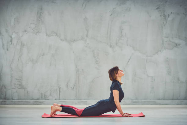 istock Woman doing yoga exercises. 1171929066
