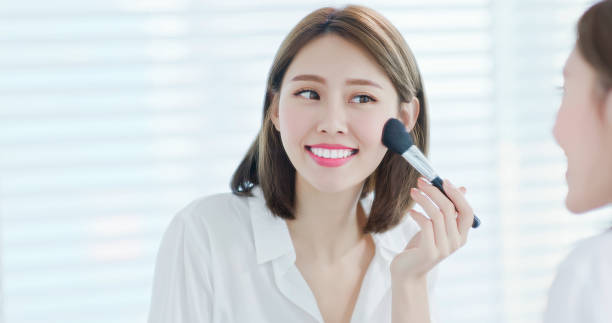istock asian woman brush blush 1171929194