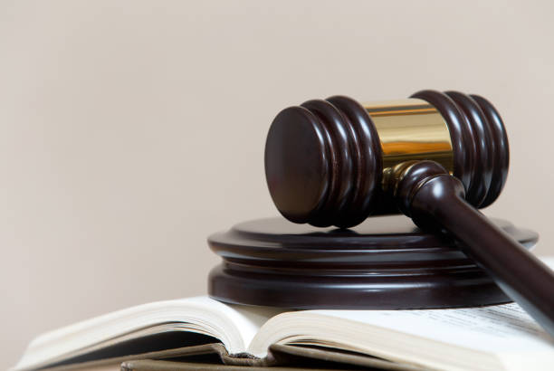 istock wooden gavel and books 1171935609