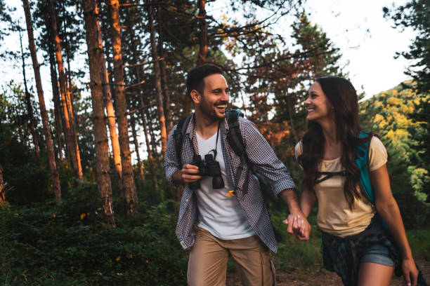 istock Couple hiking in forest 1171935867