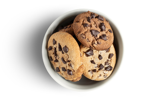 Chocolate Chip Cookies in bowl on white with clipping path. This file is cleaned and retouched