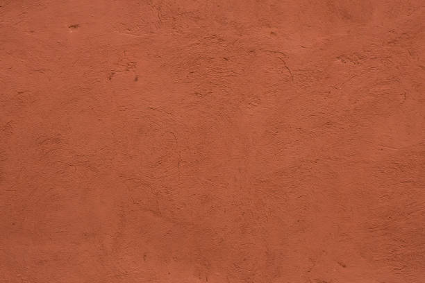 Full frame image of textured stucco in bright terracotta color High resolution texture for 3d model, background, pattern, poster and collage terracotta stock pictures, royalty-free photos & images