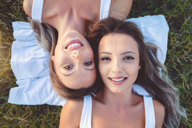 istock Two young adults lying on the grass 1171948628