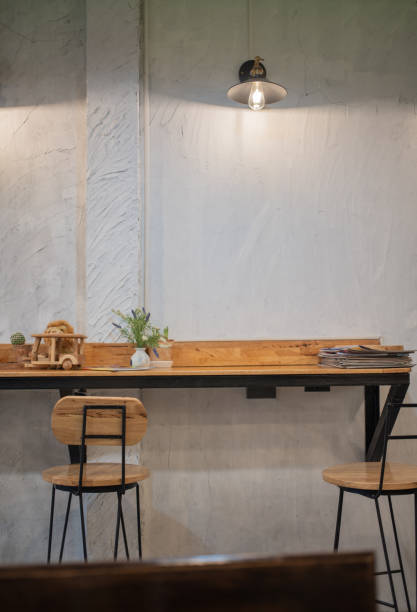 istock Empty on people . Coffee shop   interior design With chairs and white walls. 1171954614
