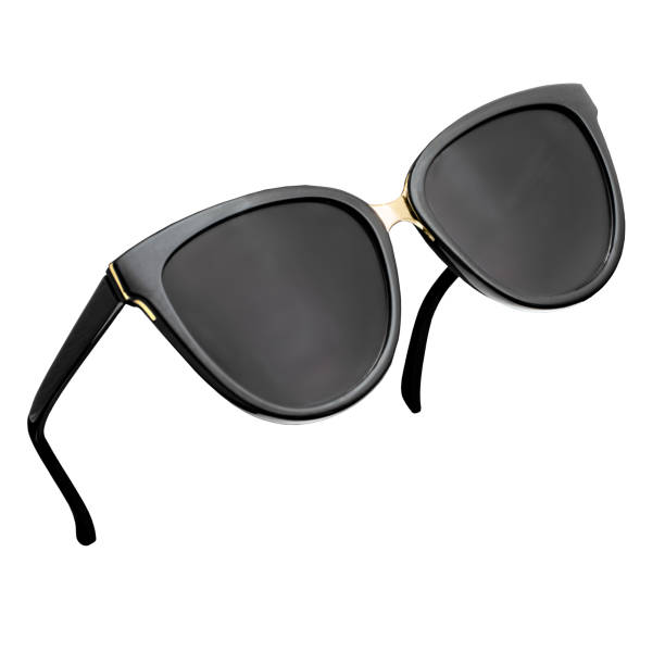 primer plano de gafas de sol femeninas negras y doradas aisladas en blanco - gafas de sol fotografías e imágenes de stock