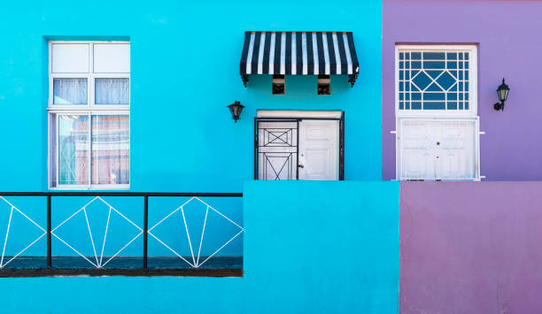 Bo Kaap, Cape Town, South Africa Cape Town, South Africa - May 3, 2018: Purple and blue facade with doors and windows in the colorful malay district of Bo Kaap in Cape Town, Western Cape province, South Africa. malay quarter photos stock pictures, royalty-free photos & images