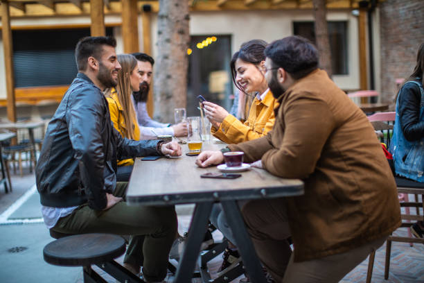 istock Best friends sharing funny stories in cafe 1171957488
