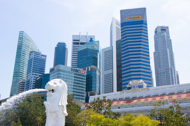 Marina bay ,Singapore  - July 20 , 2014 :Panoramic of the Singapore Cityscape near Merlion statue and Marina Bay, the marina is the centre of the economy