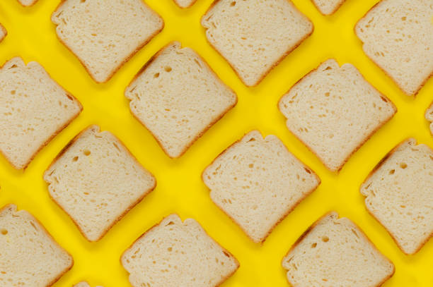Slice of Toasted Bread on Yellow Background
