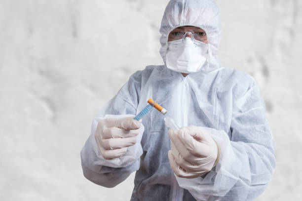 istock Criminalist collecting evidence at crime scene 1171963316