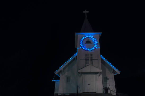 istock Blue lights adorn old church at night 1171976614