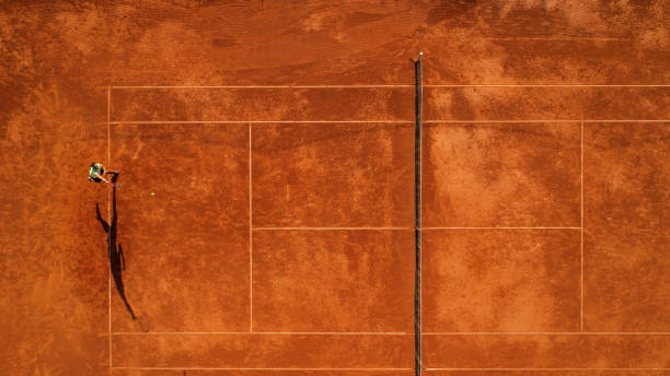 istock One tennis player on clay court 1171977338