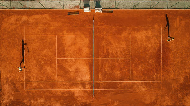 istock Two tennis players on court 1171977351