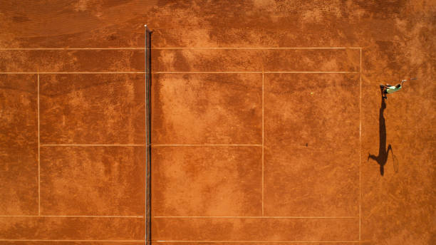istock One tennis player on clay court 1171977360
